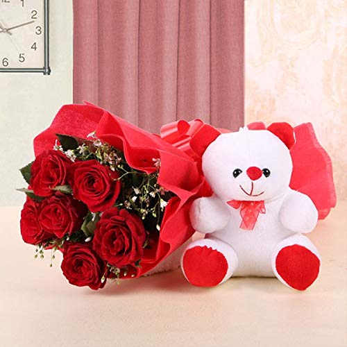 cute small teddy with red roses bunch