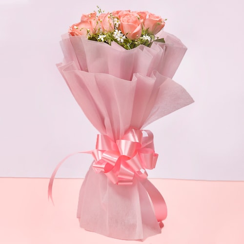 pink rose bouquet in paper packing