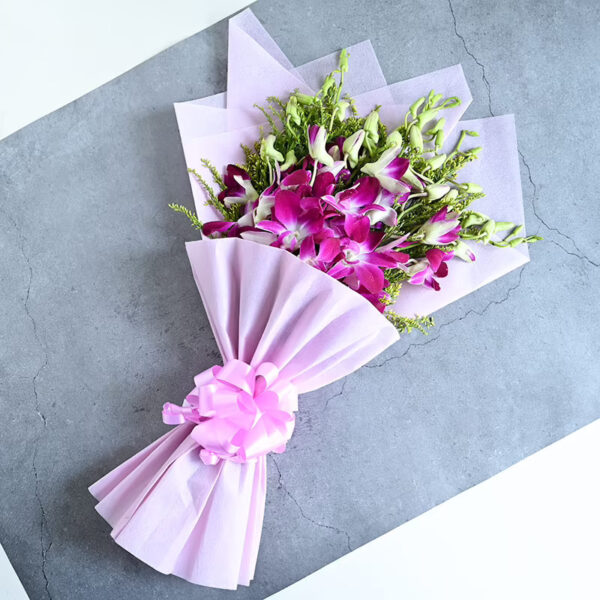 orchid bouquet in paper packing